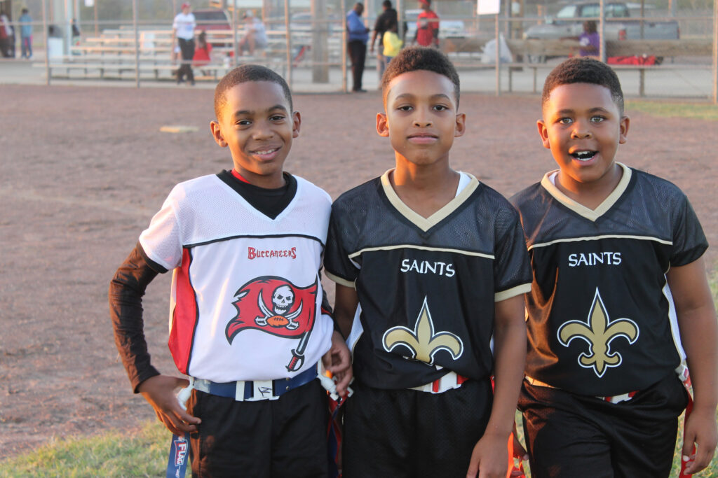 Kids taking a picture in a play field